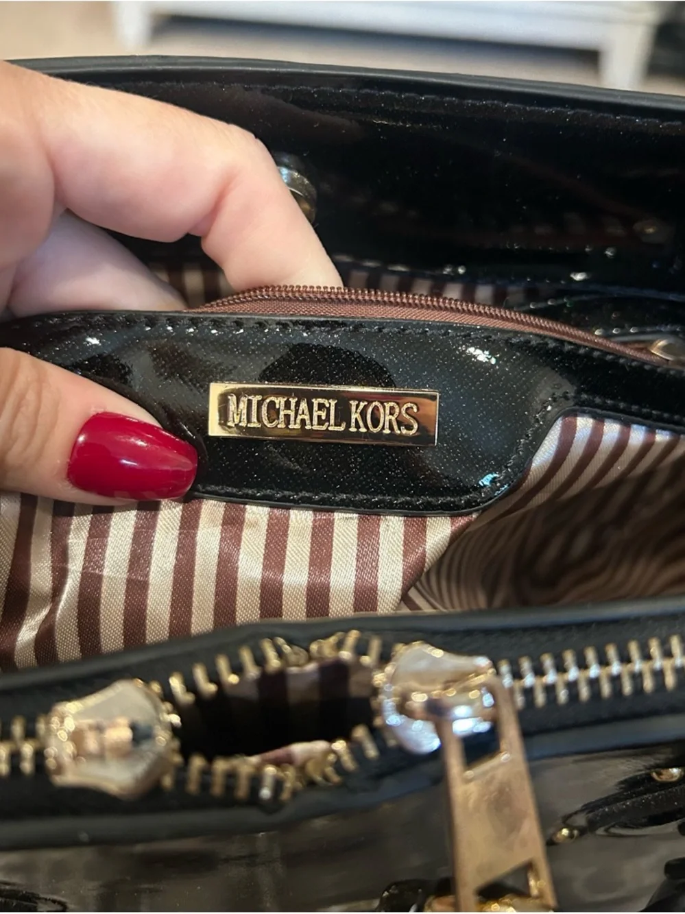 Michael Kors Black Patent Satchel with Gold Lock and Logo Medallion